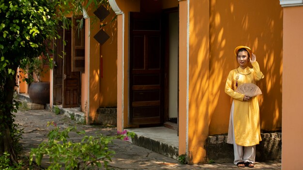 Woman wearing traditional ao dai clothing