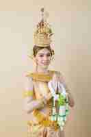 Free photo woman wearing typical thai dress