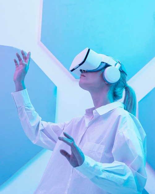 Woman wearing virtual reality simulator