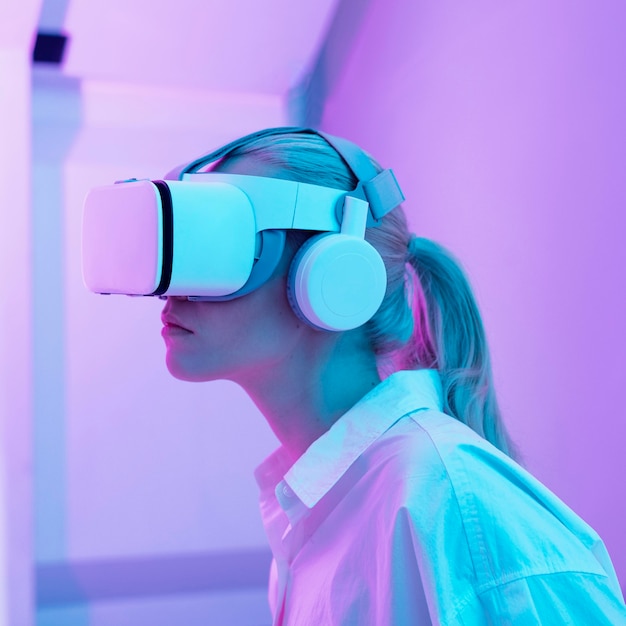 Woman wearing virtual reality simulator