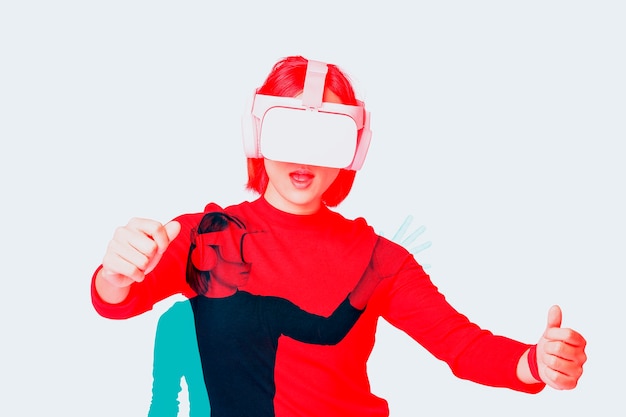 Woman wearing VR headset smart technology in double color exposure effect