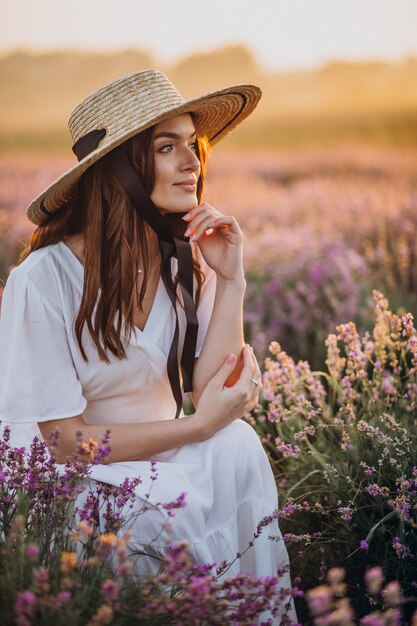 Woman in white dress in a lavander field