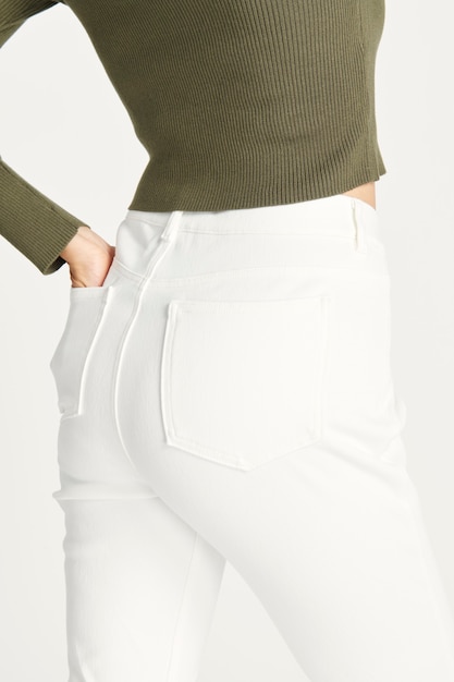 Woman in a white jeans, rear view