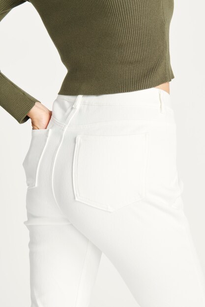 Woman in a white jeans, rear view
