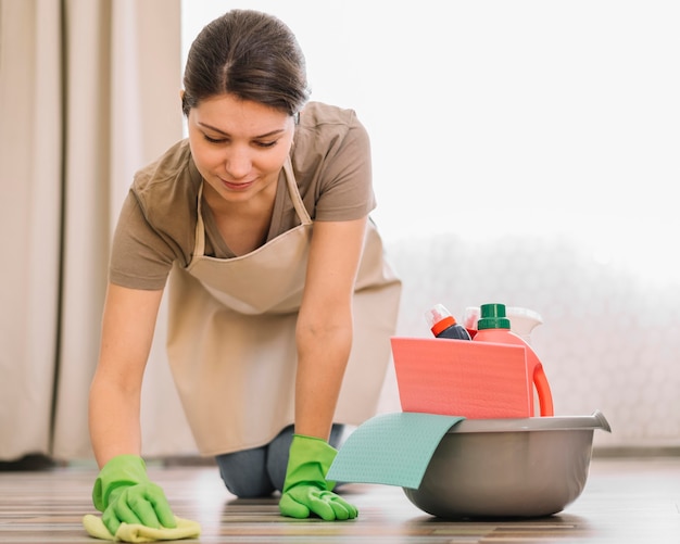 Woman wiping the floor