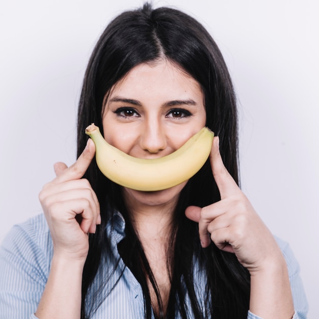 Woman with banana smile