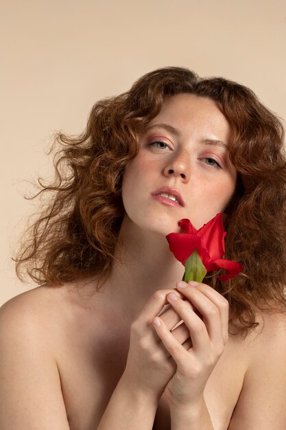 Woman with beautiful gladiolus flowers