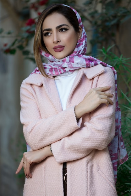 Woman with beige trench coat