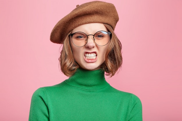 Woman with beret and turtleneck sweater