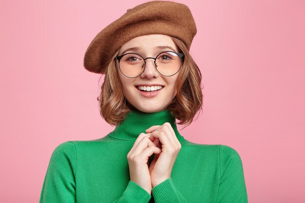 Woman with beret and turtleneck sweater