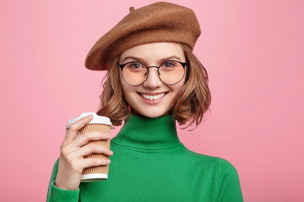 Woman with beret and turtleneck sweater