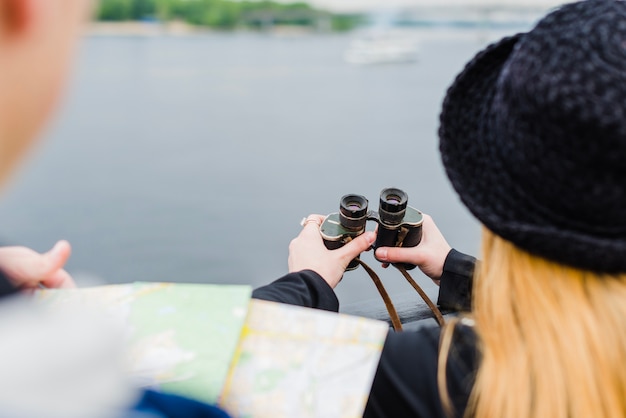 Free photo woman with binoculars