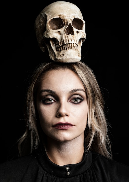 Woman with blonde hair and skull