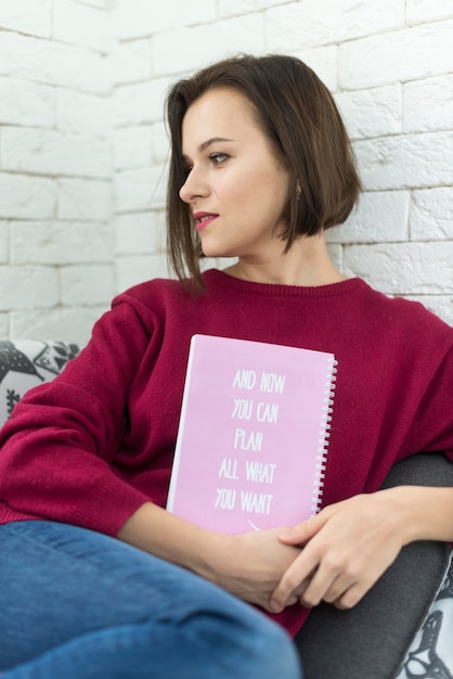 Woman with book in hand