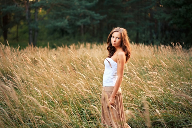 Woman with brown skirt spending the day in the field