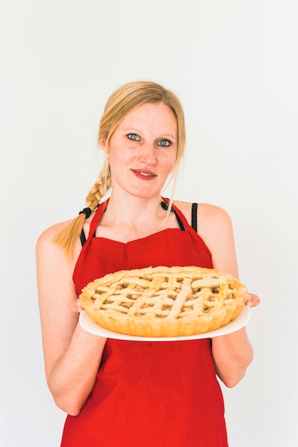 Woman with cake on plate