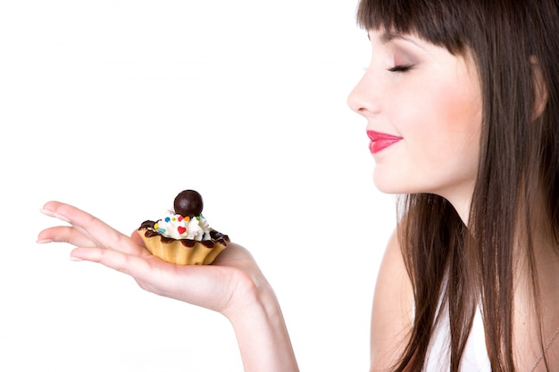 Free photo woman with a cake