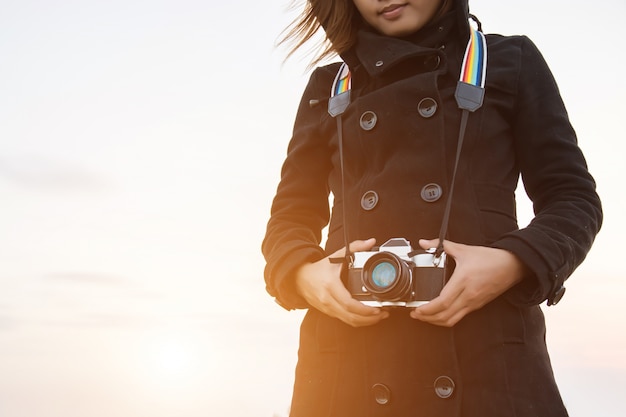 Free photo woman with a camera