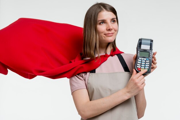 Woman with cape holding pos