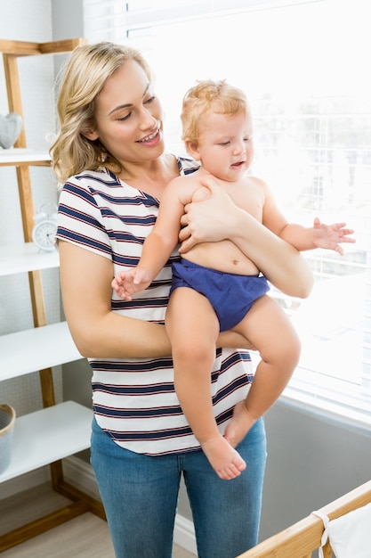 Woman with child in her arms