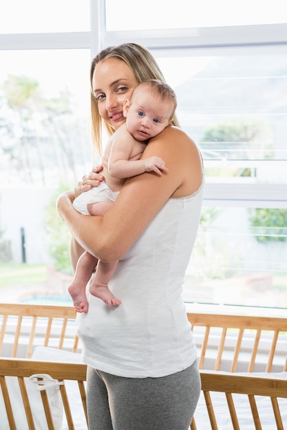 Free photo woman with child in her arms