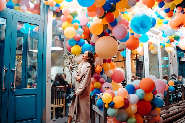 Woman with colorful balloons