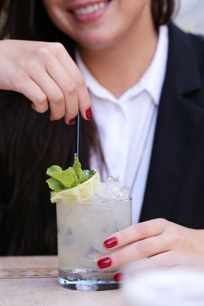 Woman with a drink