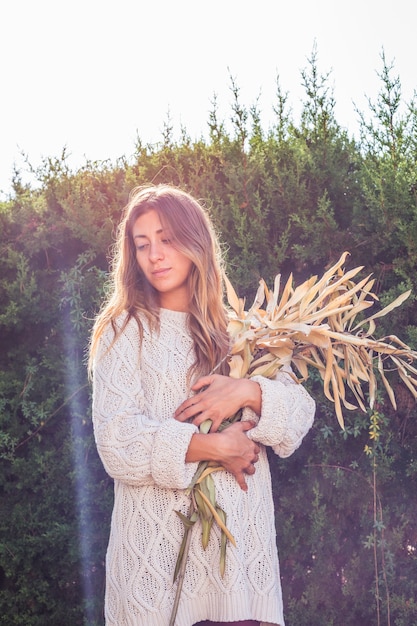 Woman with dry herbs