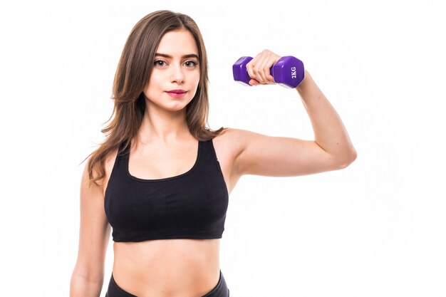 Woman with dumbbells working out and making different exercises for hands