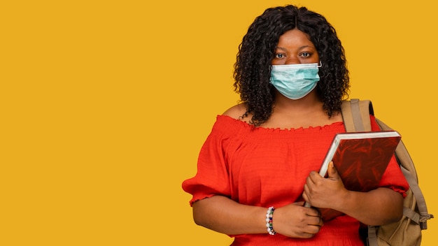 Woman with face mask concept with copy space