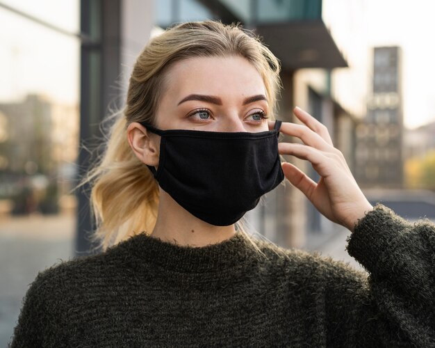 Woman with face mask and social distance concept