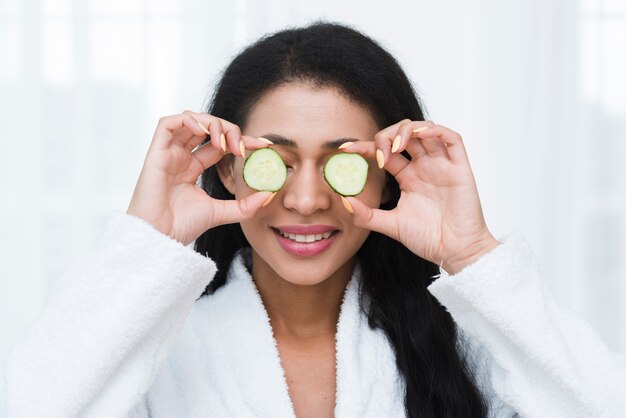 Woman with a facial mask in a spa