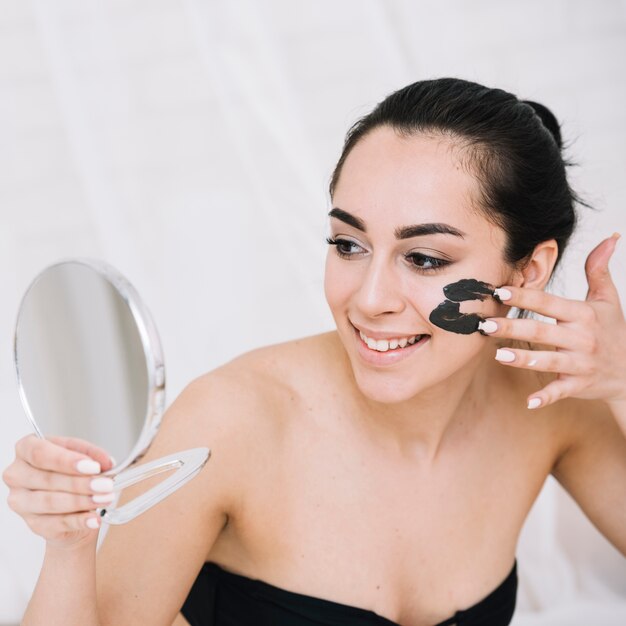 Woman with a facial treatment