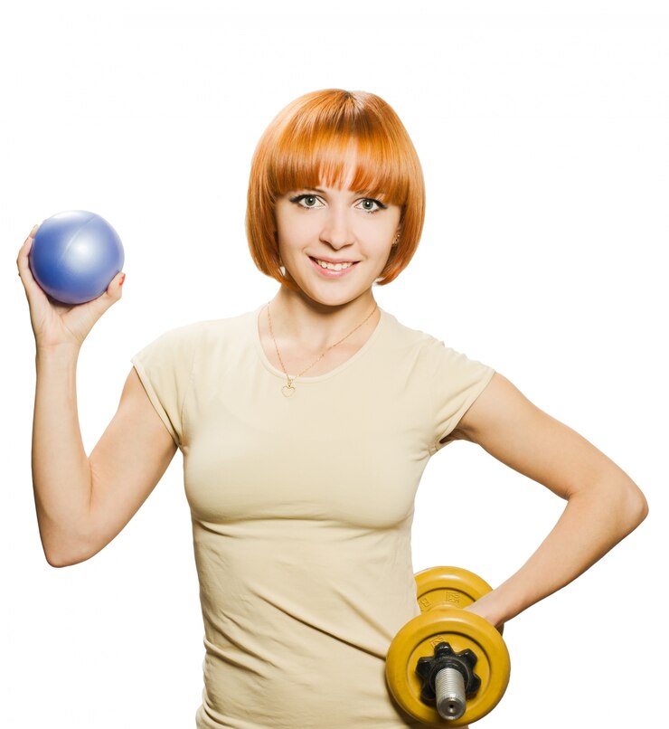 Free Photo woman with fitball and dumbbells