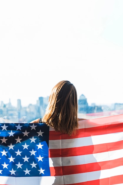 Woman with flag of America