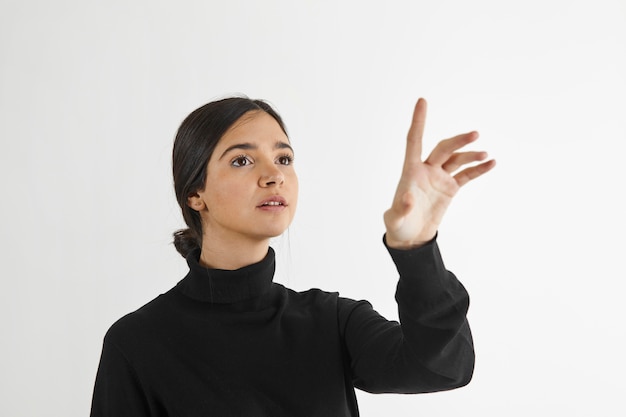 Woman with forefinger raised