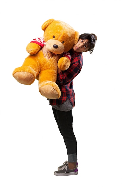 Free photo woman with a giant stuffed