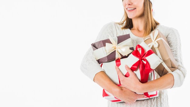 Woman with gift boxes on white background 