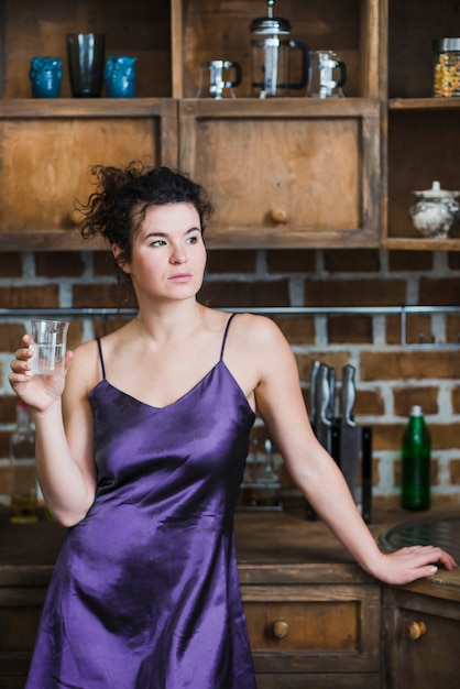 Free photo woman with glass of water