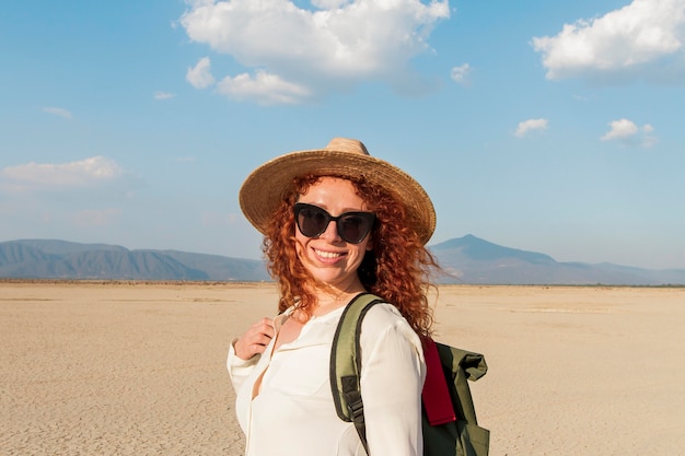 Woman with hat traveling