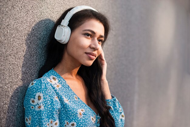 Woman with headphones close-up