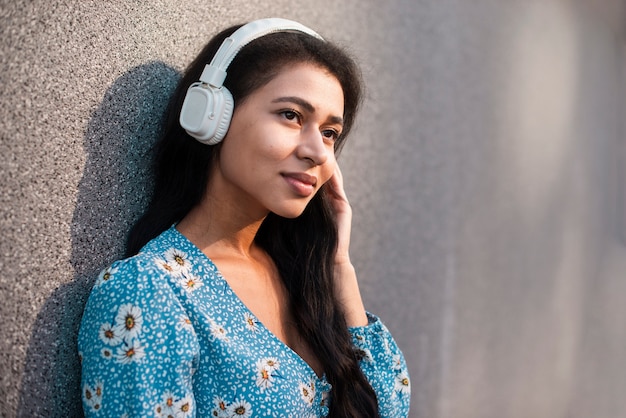 Woman with headphones close-up