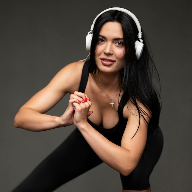 Woman with headphones training