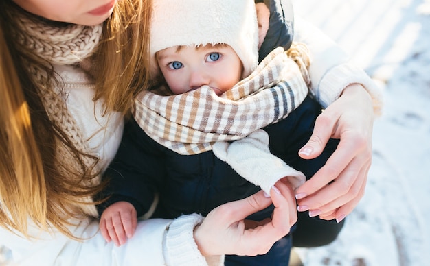 Woman with her baby in arms