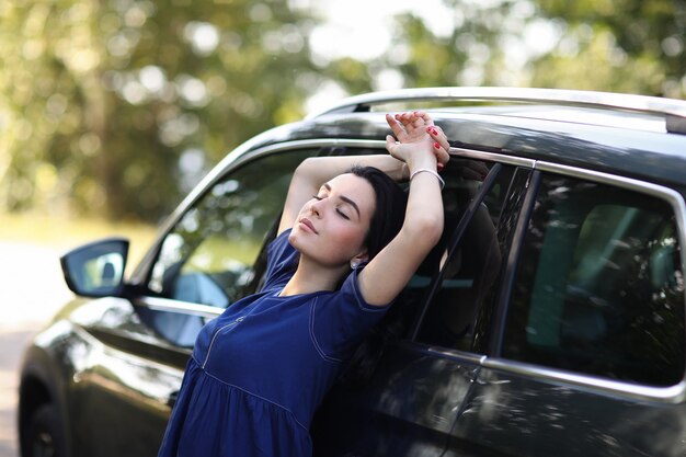 Woman with her car