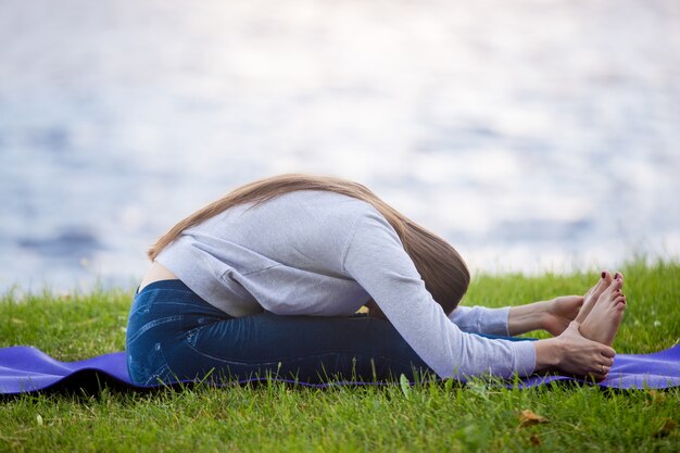 Woman with her head on his legs