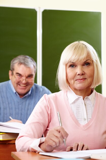 Woman with her husband learning at school