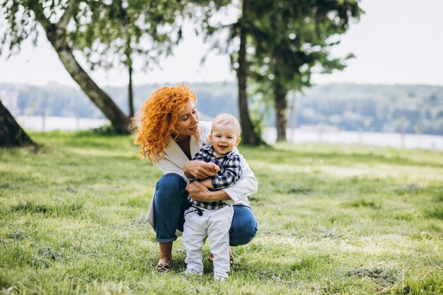 Woman with her son having fun in park