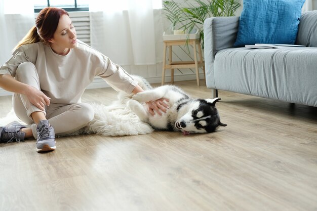 Woman with husky