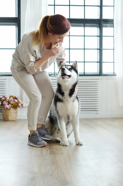 Woman with husky